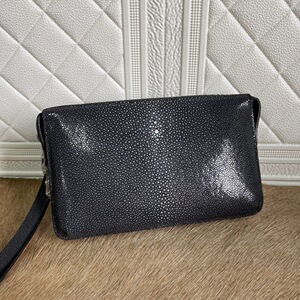 珍珠鱼皮手包男密码