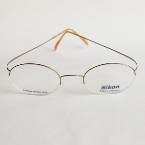 【小翻】nikonj7508金色铝盒无螺丝钛titanium眼镜架日本制超轻