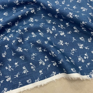 进口牛仔蓝棉麻印花面料夏季新款透气麻碎花连衣裙女衬衫服装布料