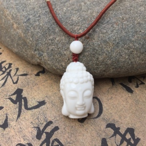 西藏象牙玉 纯白色佛头像玉吊坠 丁青县原石非猛犸象牙制品