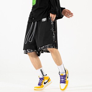 李宁假两件裤子