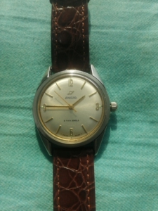 tb890315442淘宝莺歌手表男款,原装进口,不能走时,成色见图,裸机头