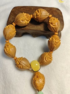 橄榄核雕刻——包衣弥勒.刘人义弥勒.