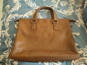 蒙娜丽莎男士皮包  质感超好,头成牛皮  原价2000多