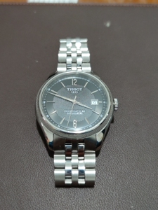 天梭新宝环机械男表,t108408a,防磁硅游丝天文台认证8