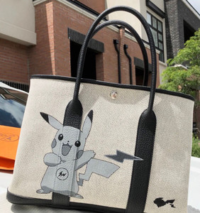 000人付款淘宝蕾丝凯莉彩绘涂鸦恶搞爱马仕真皮拼色包包粉红色的