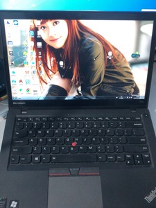 个人自用联想ThinkPad T450S。屏幕支持触摸，鼠标