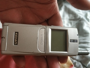 科健k98手机.战斗品相,耳孔堵塞,开机屏好,按键有效,听简