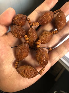 须木生橄榄核雕