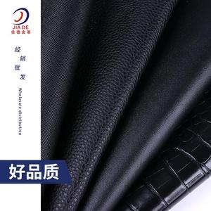 厂家新款直供拉毛底PVC荔枝纹十字纹黑色皮革箱包手袋面料人造革