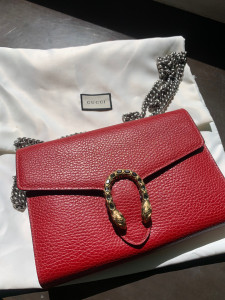 gucci蛇头包酒神