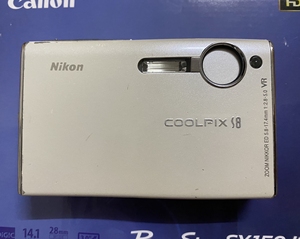 尼康s8奶白机!很漂亮!