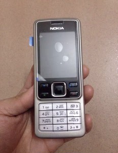 Nokia/诺基亚 6300配一个电池一个充电器 送卡套，，