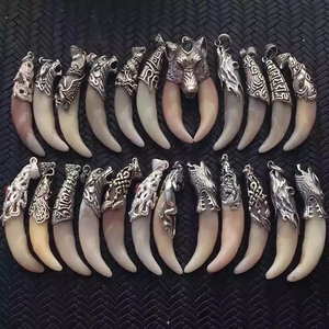 爆款纯银狼牙套鱼化龙吊坠豹子头民族风包银套整套真獒骨质双牙套