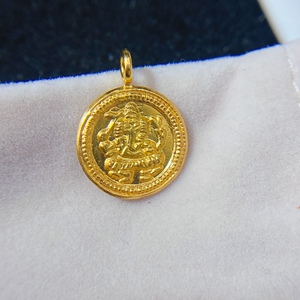 18k尼泊尔金吊坠 孔约2.8mm 宽约16mm 无钢印1.51克338一克