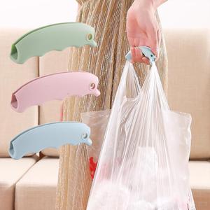 硅胶防勒手方便省力提菜器 塑料袋提手 买菜手提袋拎袋工具便携