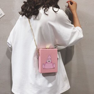 旺仔牛奶斜挎包手机袋休闲单肩包立体袋小包包个性链条青年新款潮