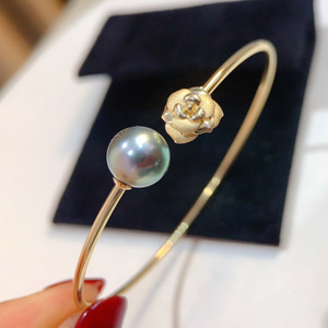 任天真大溪地黑珍珠手镯g18k金伯爵花喷砂10-11mm正圆强光海水