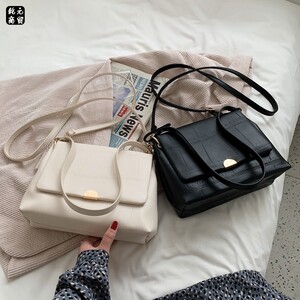 可以装雨伞的包包