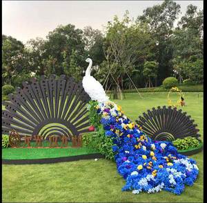 大型花艺孔雀模型插花玻璃钢售楼部小区网红拍照凤凰绿雕美陈开屏