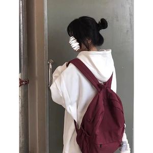 纯色书包女大学生韩版初中校园双肩包ins大容量简约森系百搭背包