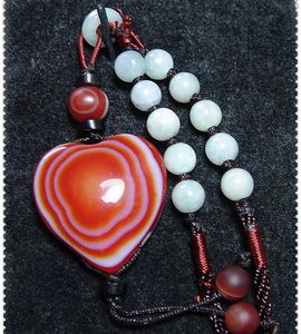 西藏纯天然九眼页岩彩虹眼爱心天珠带精美挂绳