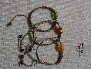 五色线编织六字真言珠子 五彩手链 2.99元/条