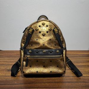 95新mcm金色双肩包中号