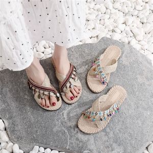 西双版纳手工拖鞋女夏外穿波西米亚时尚流苏民族风坡跟沙滩鞋