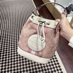 小惠在纽约coach蔻驰水桶包女 dempsey老花中号小号手提斜挎美代