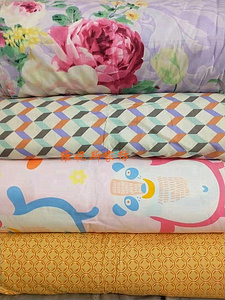 纯棉新款印花卡通长条刀口布手工拼接床单被套四件套按斤贰