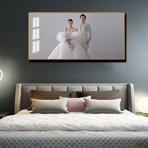 卧室结婚照挂法图片