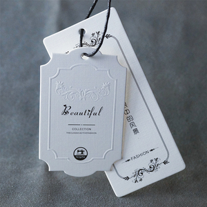 衣服吊牌定做高档服装吊牌高档设计商标压纹凹凸吊牌白色现货通用吊牌