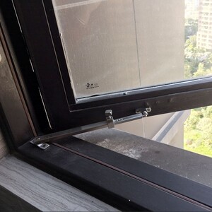 00顶谷零越专卖店天猫断桥铝平开窗限位器免打孔安装窗户安全锁酒店