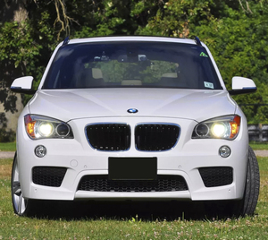 适用于08-15款宝马x1改装m大包围套件台湾生产前杠后唇侧裙pp注塑