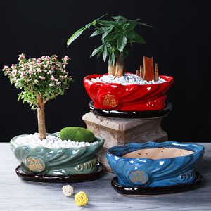 红色花盆陶瓷招财进宝