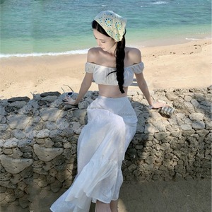白色超仙气沙滩裙三亚旅行穿搭气质露腰背海边度假一字肩连衣裙