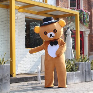 00妖精嘚尾巴fei淘宝轻松熊人偶服装cos成人行走活动演出道具头套