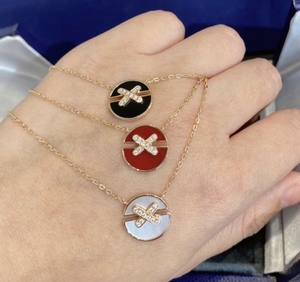 尚美巴黎项链18k金带钻圆饼交叉x型小饼白贝母满钻锁骨链蜂巢吊坠