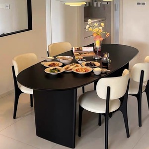 北欧黑色椭圆形实木餐桌小户型家用中古网红饭桌现代极简原木餐台