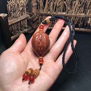 橄榄核雕刻生命之源大橄榄出入平安升职器手把件挂件文玩收藏批发