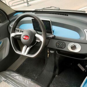 昆卡电轿k1铁壳全封闭新能源电动三轮车手把式方向盘式上牌三轮车