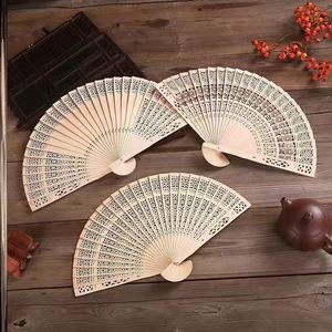 中国风夏季工艺木雕扇子木质镂空雕花香木高档香折扇礼品复古儿童