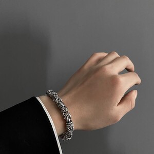 钢丝球手镯个性简约生日礼物八万一圆圈圈缠绕钛钢粗手链男嘻哈