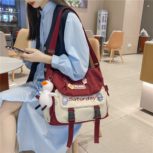 初一书包女孩大学生斜挎少女心女童初中生大容量中学生背包学院风