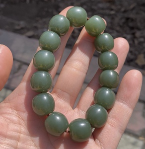 新疆和田玉且末料湖水绿卡13x14老型珠手串老型珠手链
