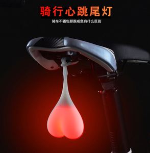 自行车尾灯USB充电警示闪灯创意蛋蛋灯防雨防水心跳灯户外夜行灯