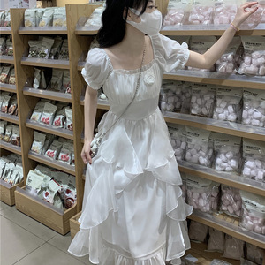 白色初恋连衣裙女2024夏季新款设计感收腰仙女裙长裙立体花朵白色