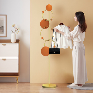 轻奢时尚衣架落地卧室挂衣架家用网红衣服架子立式门口简易衣帽架