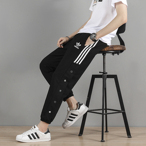 adidas阿迪达斯三叶草纽扣排扣裤运动裤男休闲宽松束脚收口裤子女